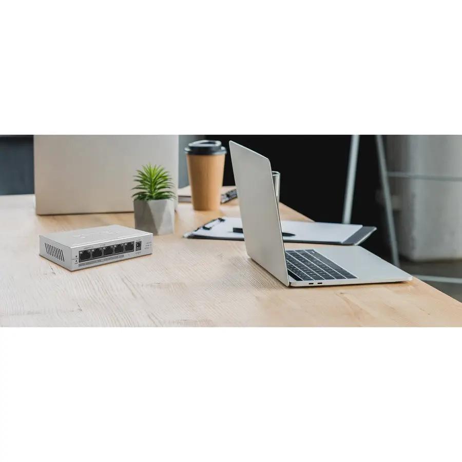 Zyxel GS1005HP 5-Port Gigabit PoE+ unmanaged switch with gray metal housing on a desk