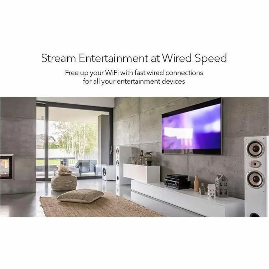 NETGEAR GS305 5-Port Gigabit Unmanaged Switch lifestyle image in a modern living room
