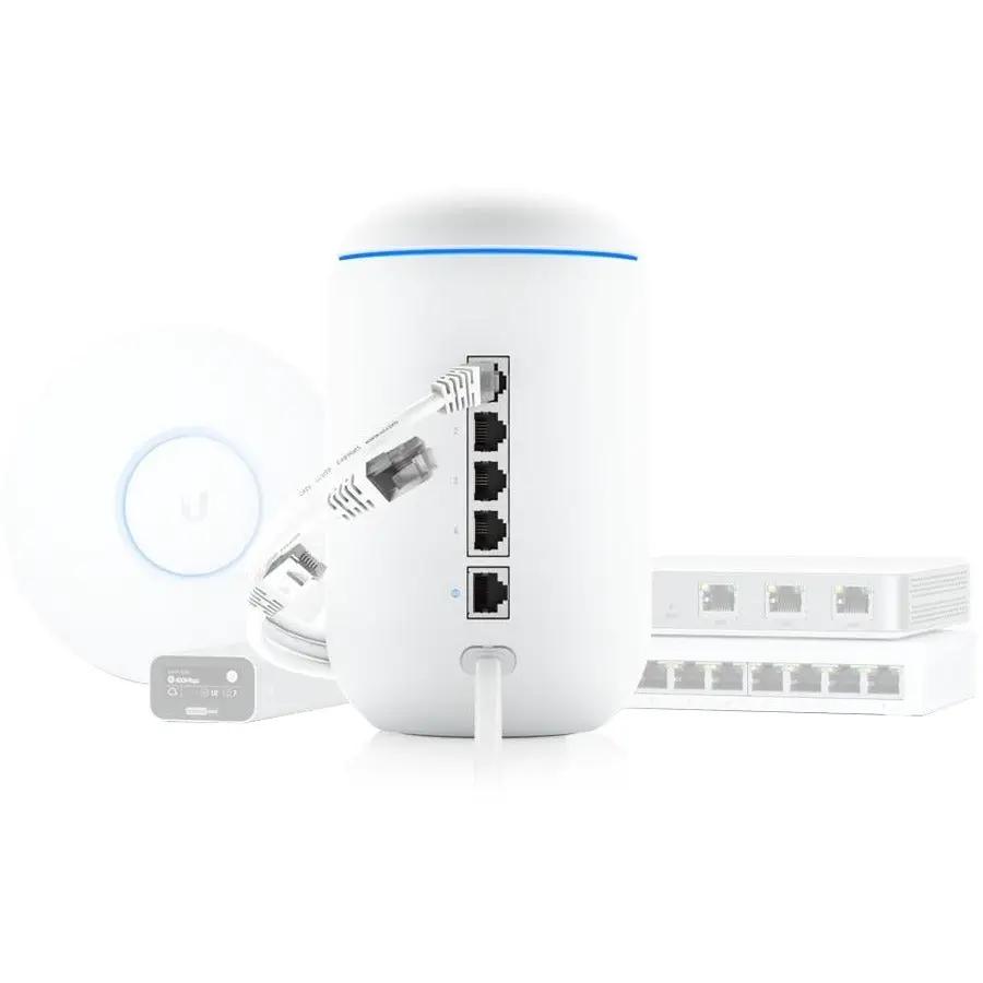 Ubiquiti UniFi UDM 4-Port Gigabit WiFi5 Router, white; three UniFi devices shown