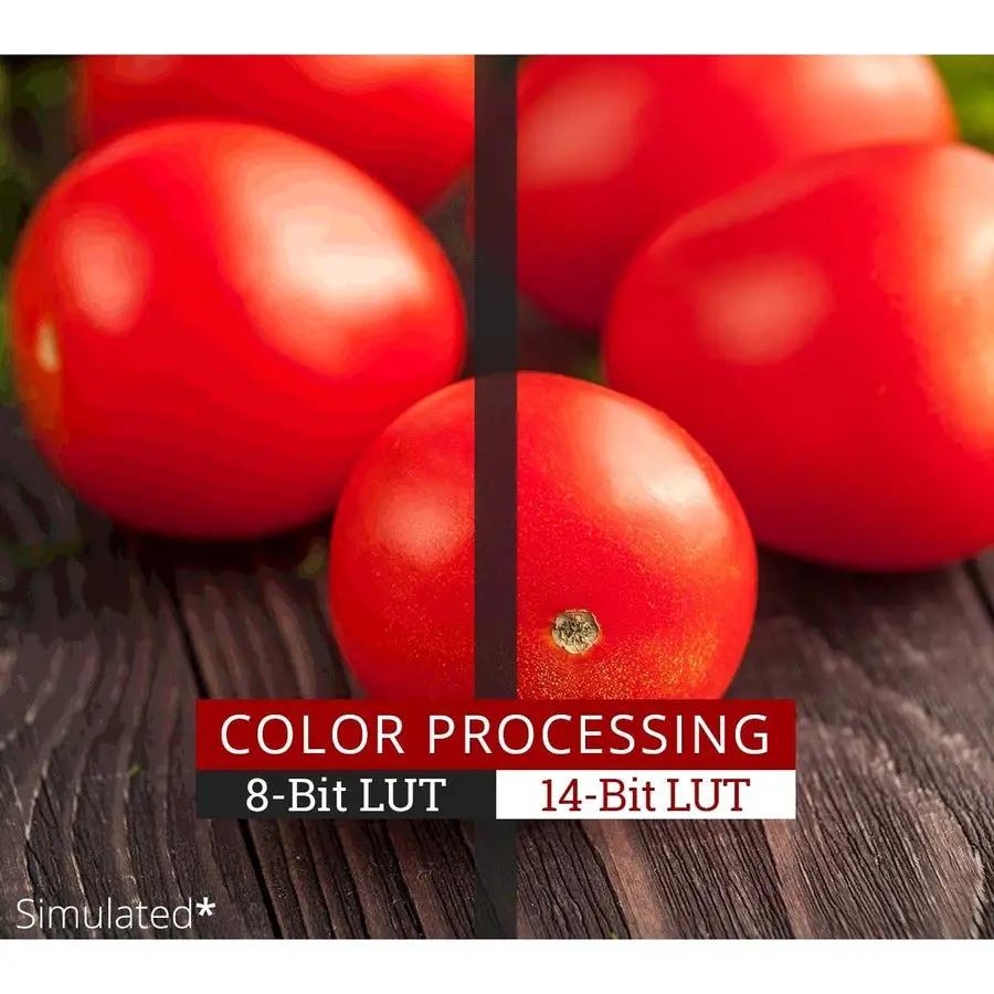 Several tomatoes on a wooden surface with a vertical dark divider and a color-processing LUT overlay (8-bit vs 14-bit)