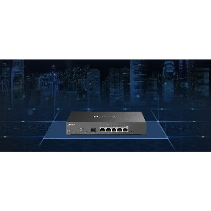 TP-Link Omada ER7206 Gigabit Managed Router, gray metal chassis on a blue digital-grid backdrop