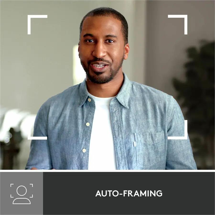 Brio 500 webcam graphite in indoor setting with auto-framing UI framing a person