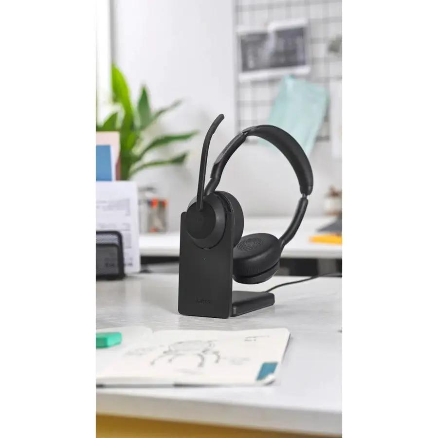 Jabra Evolve2 55 headset on a desk stand, black