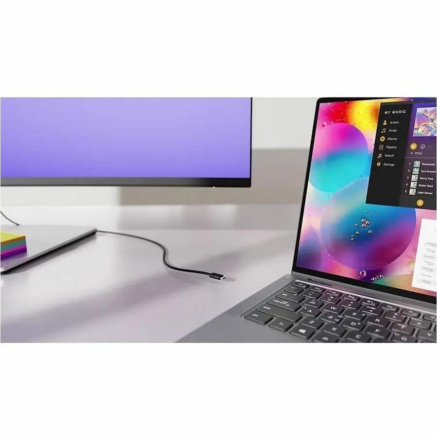 Dell UltraSharp U3824DW 38-inch curved monitor and laptop on desk, black/silver (2 devices)