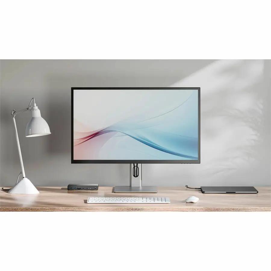 Alogic Clarity 32-inch 4K monitor with black bezel on a wooden desk