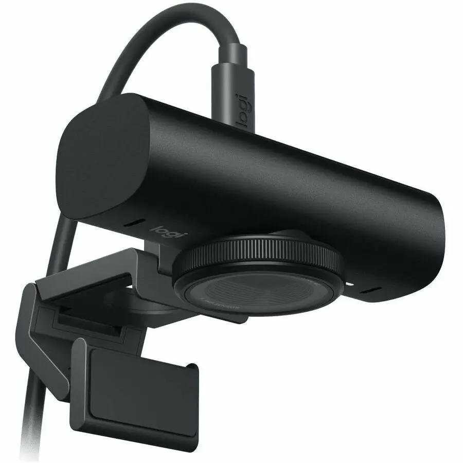 Logitech Master MX Brio webcam mounted on adjustable clamp arm, black USB-C.