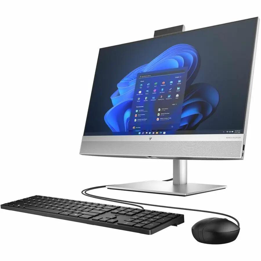 HP EliteOne 840 G9 All-in-One computer with silver finish, keyboard and mouse on white background.