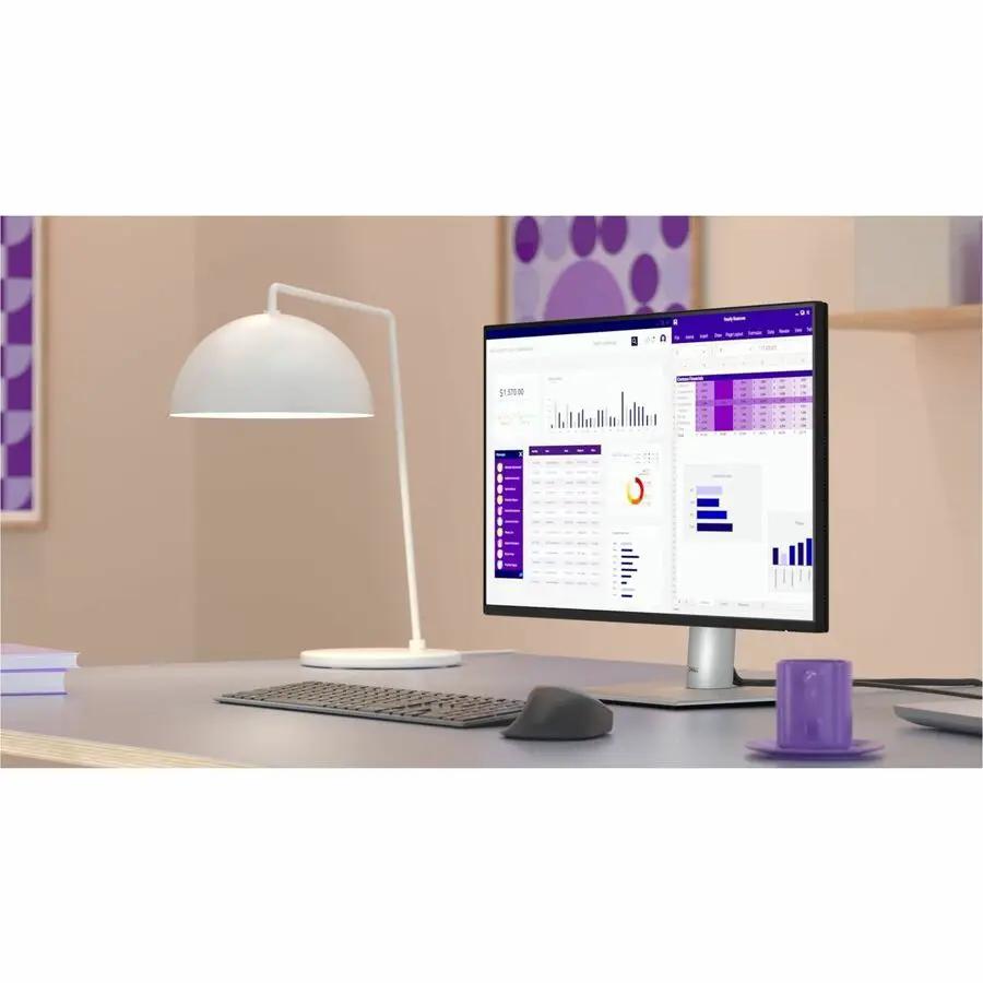 Dell P2425H 24-inch monitor with black bezel and silver stand on a desk