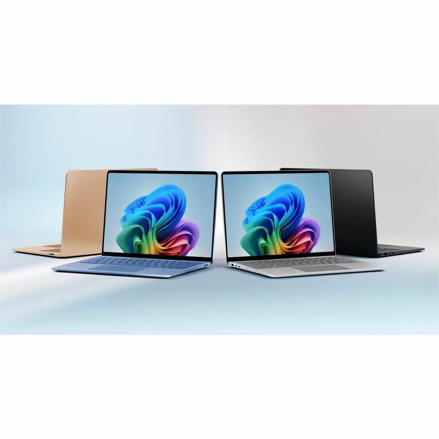 3 Microsoft Surface Laptop 7 laptops in gold, blue, and graphite with 120 Hz displays