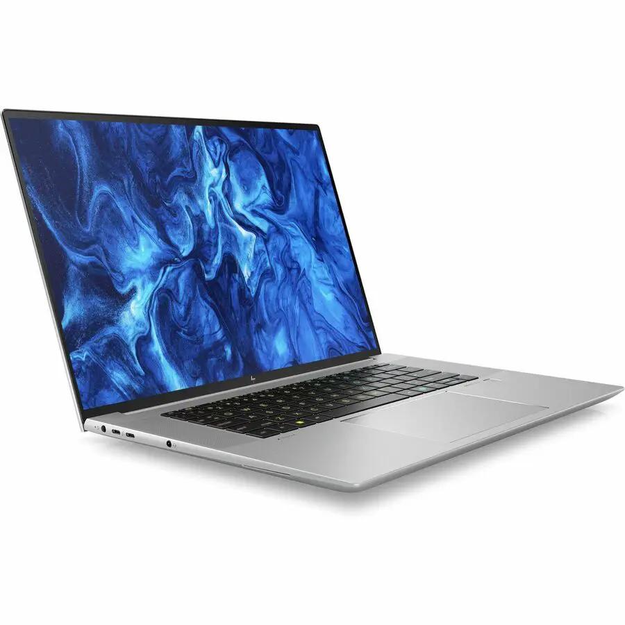 HP ZBook Studio G11 laptop with a silver aluminum chassis, shown at a slight angle