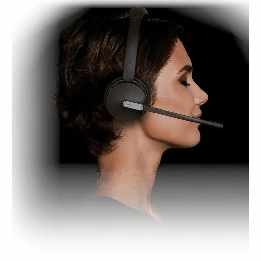 Yealink WH64 HYB Dual Stand MS headset worn by a person, black
