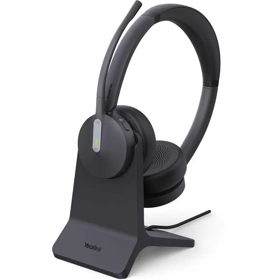 Yealink BH70 dual UC headset USB-C/A on a dark gray charging stand