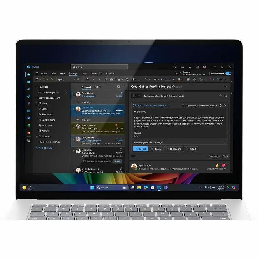 Microsoft Surface Laptop 7 in platinum with a 15-inch touchscreen and silver keyboard.