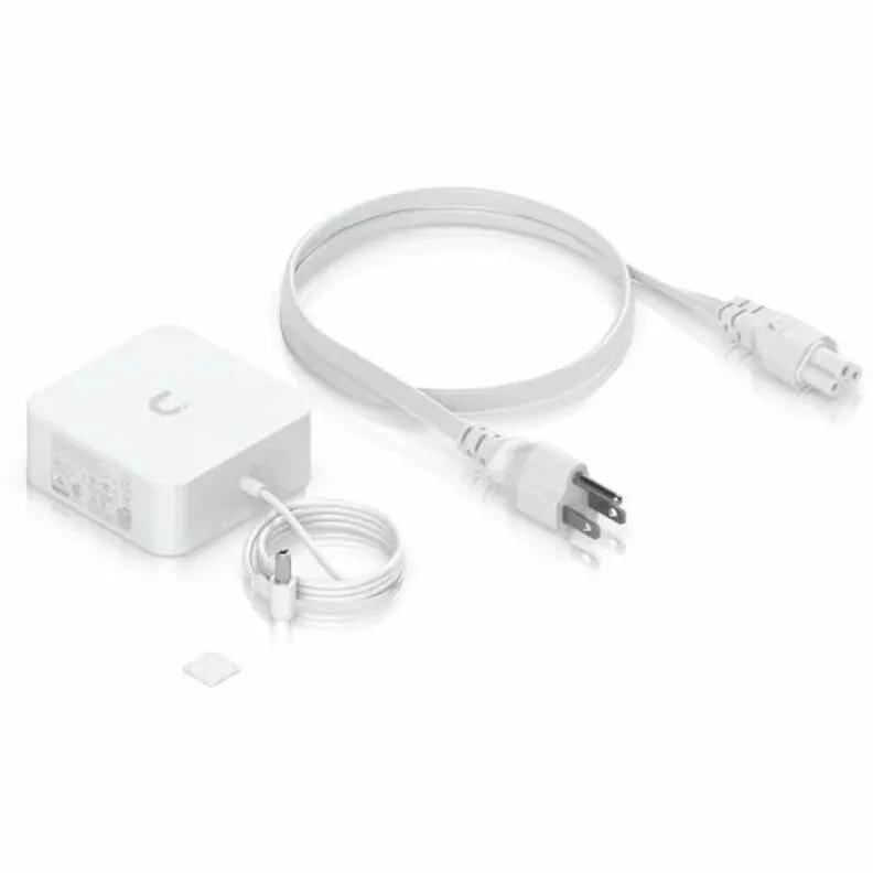 Ubiquiti UniFi Gateway Fiber white power adapter with two cables