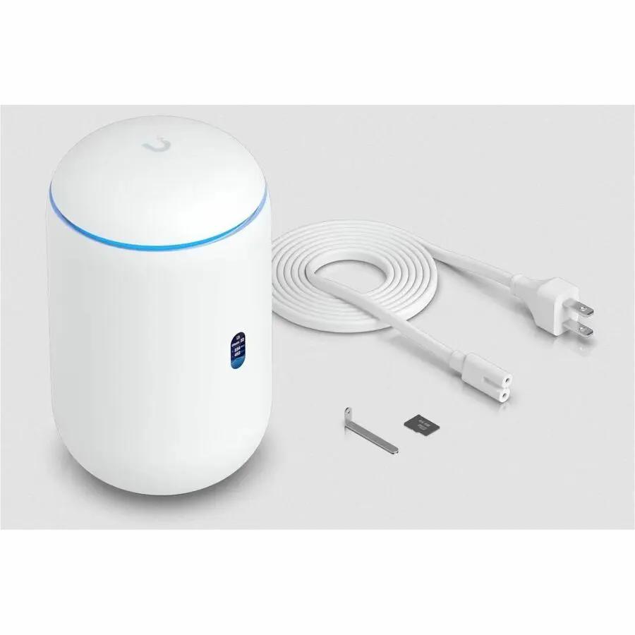 Ubiquiti UniFi Dream Router 7 4Port PoE white wireless router with blue LED ring and accessories