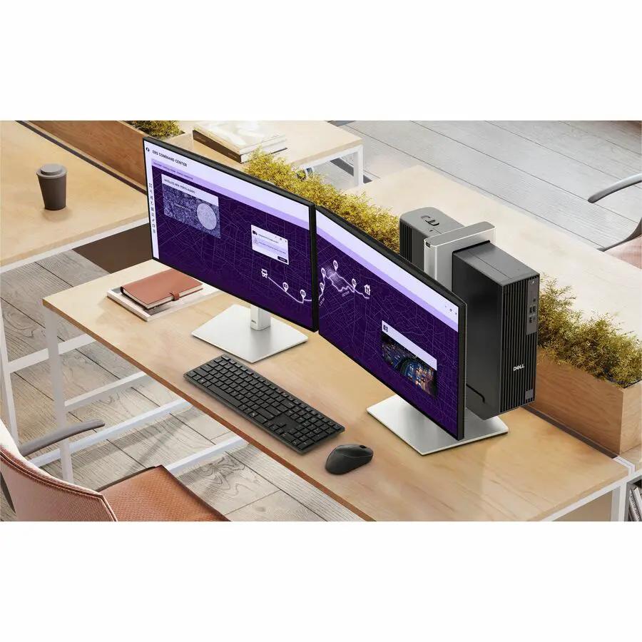 Dell Pro Slim Plus QBS1250 Desktop with two monitors, keyboard, and mouse on a wooden desk.