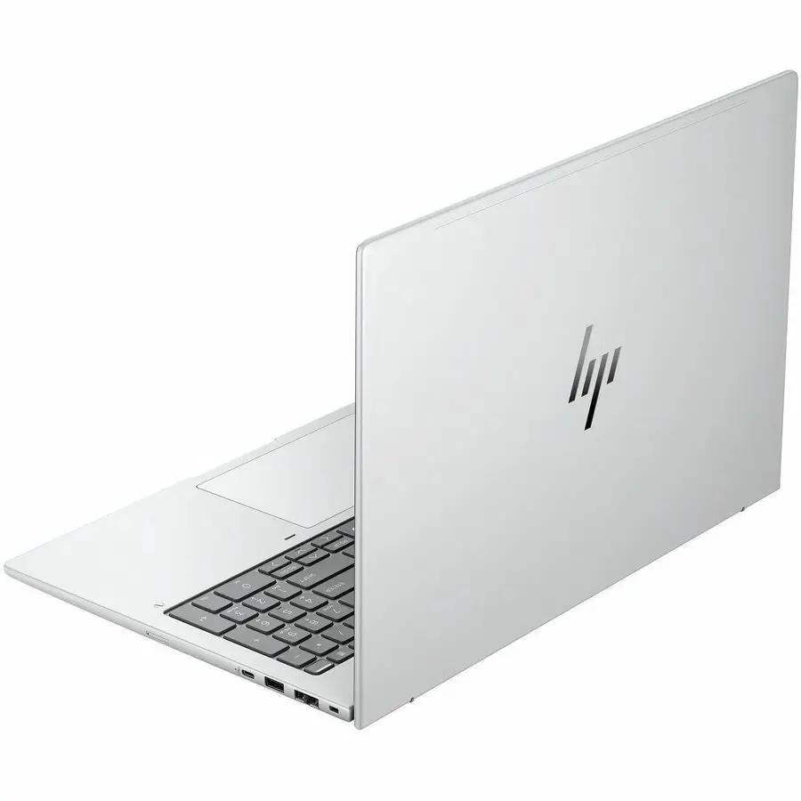HP EliteBook 8 Notebook in glacier silver aluminum, open with keyboard and HP logo.