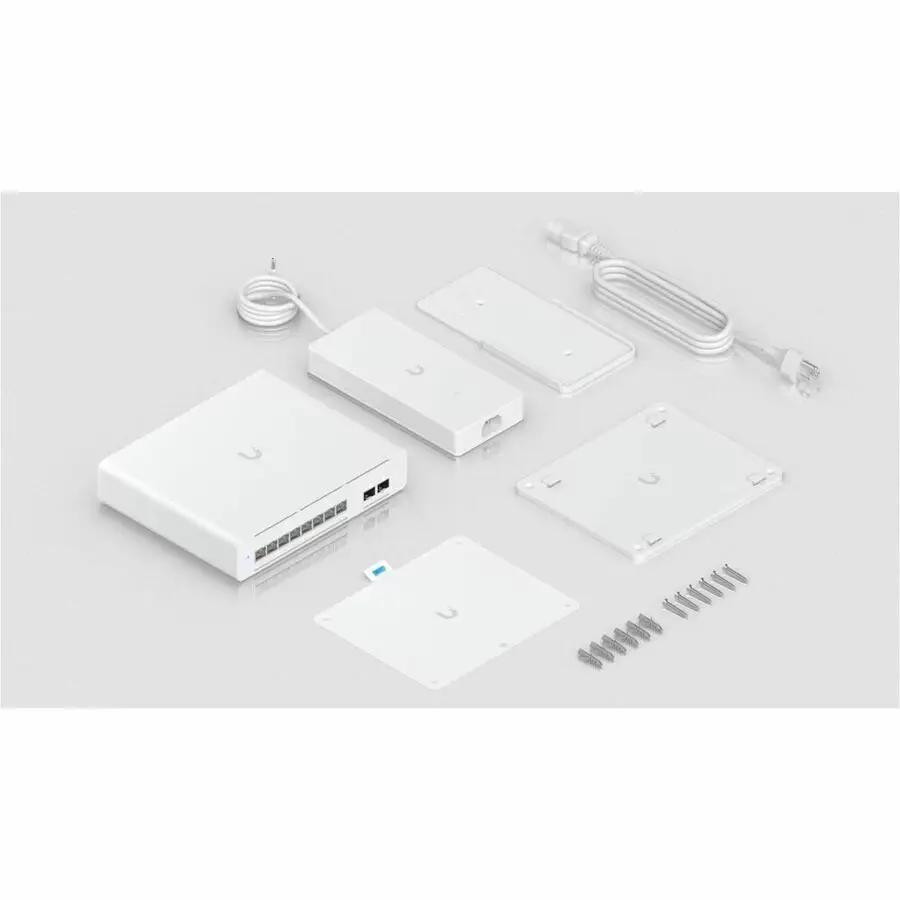 Ubiquiti UniFi Pro XG 8-Port 10GbE PoE SFP+ switch kit with white mounting plates and screws