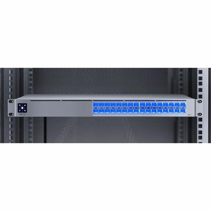 Ubiquiti Pro XG Aggregation 32-Port SFP Managed Switch in a rack with blue ports