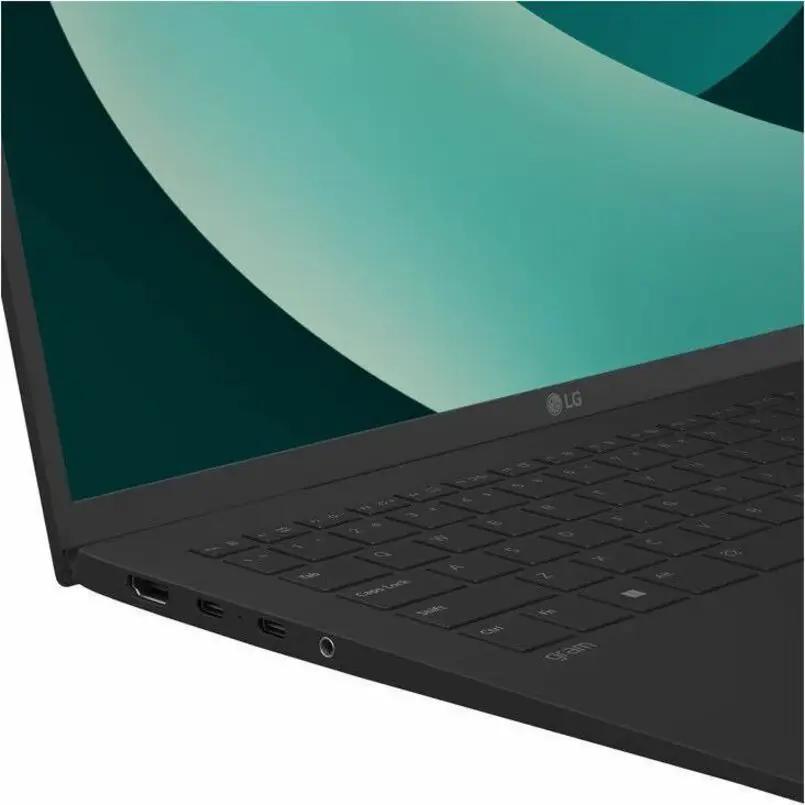 LG Gram 15 laptop, black chassis with visible left-side ports (USB-C, HDMI, USB-A) and keyboard