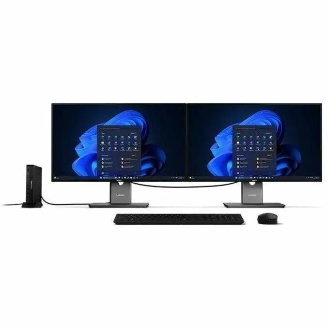 Lenovo ThinkCentre M70q Gen 6 mini PC desktop setup with dual monitors, keyboard, and mouse