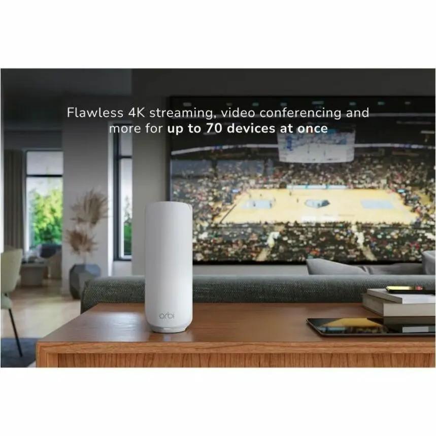 NETGEAR Orbi ORBI3 5Gbps WiFi7 router white on wooden table in living room