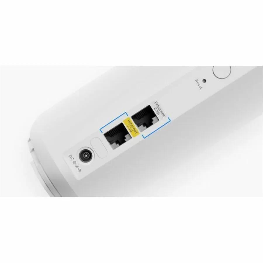 NETGEAR Orbi ORBI3 white WiFi 7 router rear view with two highlighted Ethernet ports