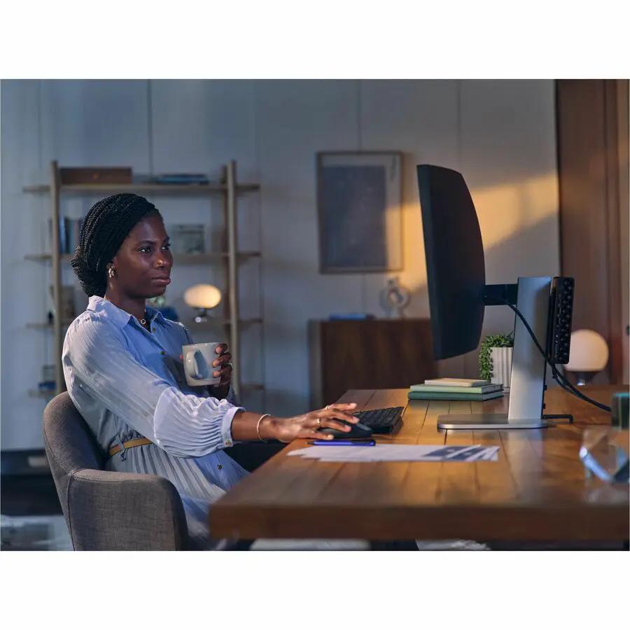 HP EliteDesk 800 G1aAI Mini PC on an office desk with monitor, keyboard and mug.
