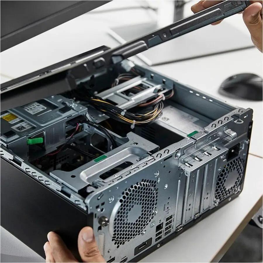HP EliteDesk 8 G1i Tower desktop computer with metal case; interior components visible.