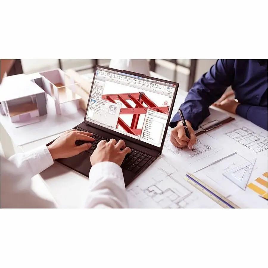 ThinkPad P16v G3 laptop by Lenovo, black, opened on desk with architectural design plans
