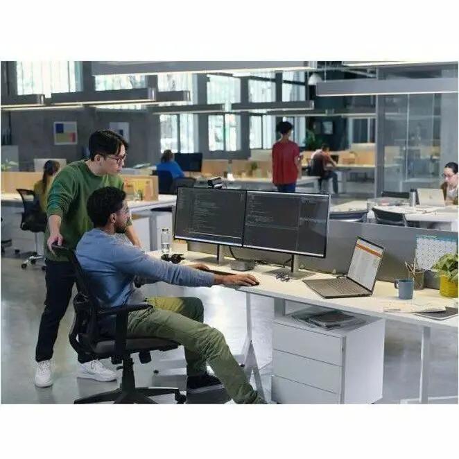 HP ZBook X 16 mobile workstation laptop in an open office with dual external monitors