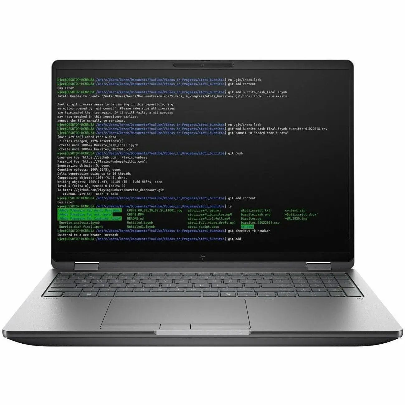 HP ZBook Fury 16 mobile workstation laptop, silver body with code on screen