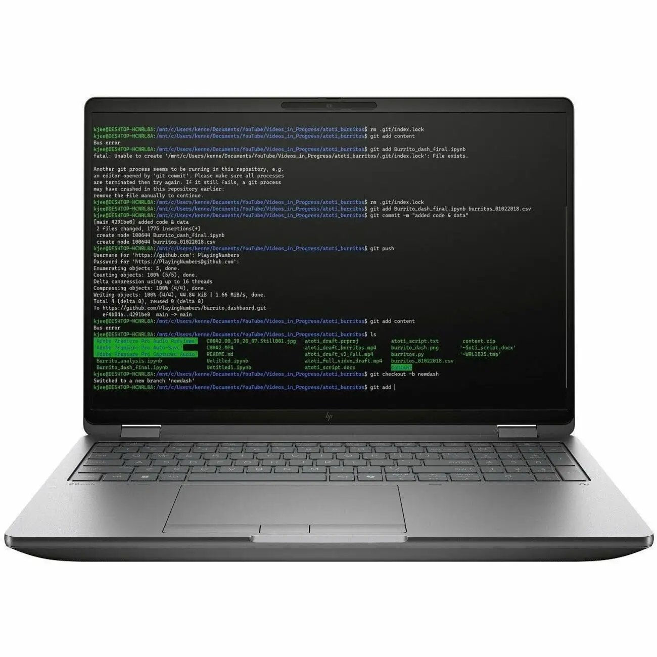 HP ZBook Fury 16 Mobile Workstation laptop in silver, displaying code on screen