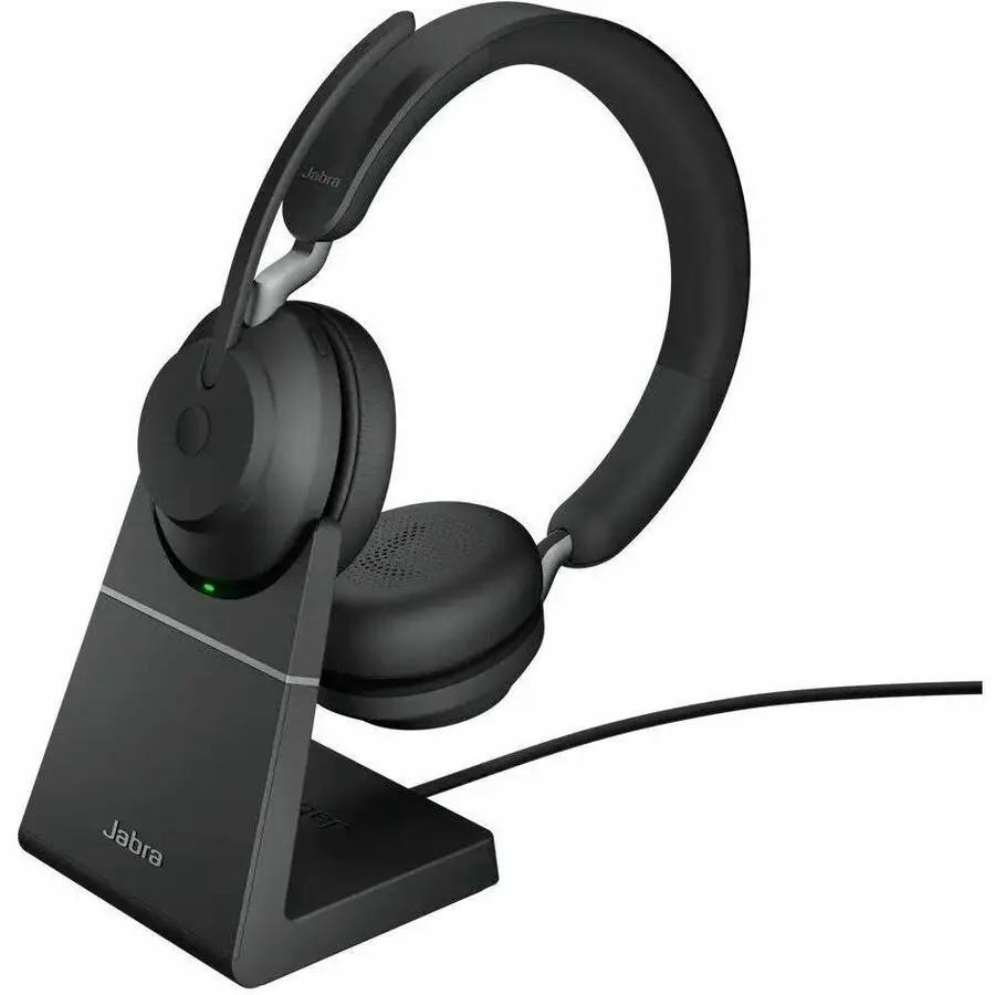 Jabra Evolve2 65 MS Stereo headset on a black charging stand