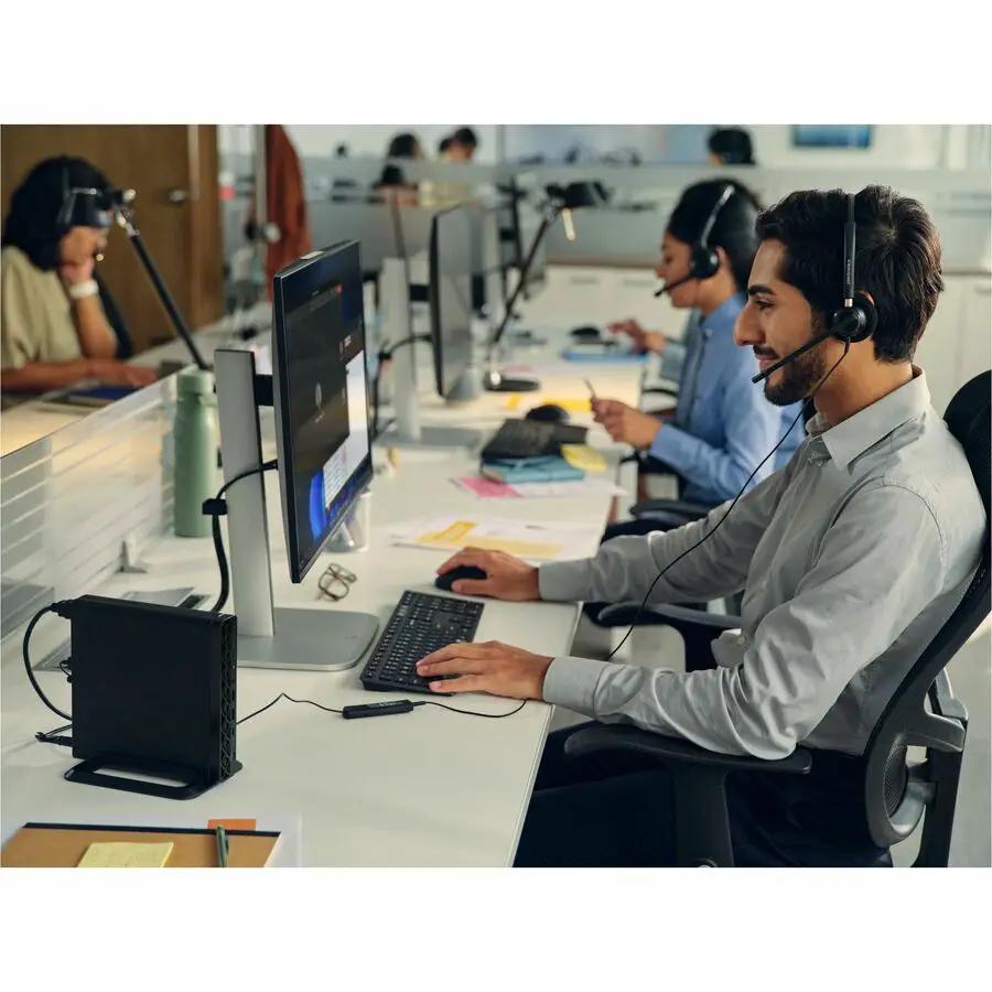 HP ProDesk 4 Mini G1i U5235T desktop PC on a desk in a row of call-center workstations