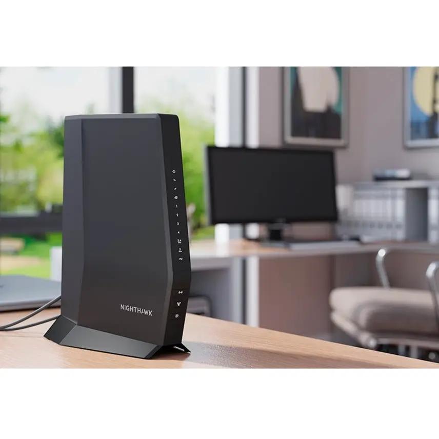 Netgear Nighthawk AX6 Wi-Fi 6 router on desk, black