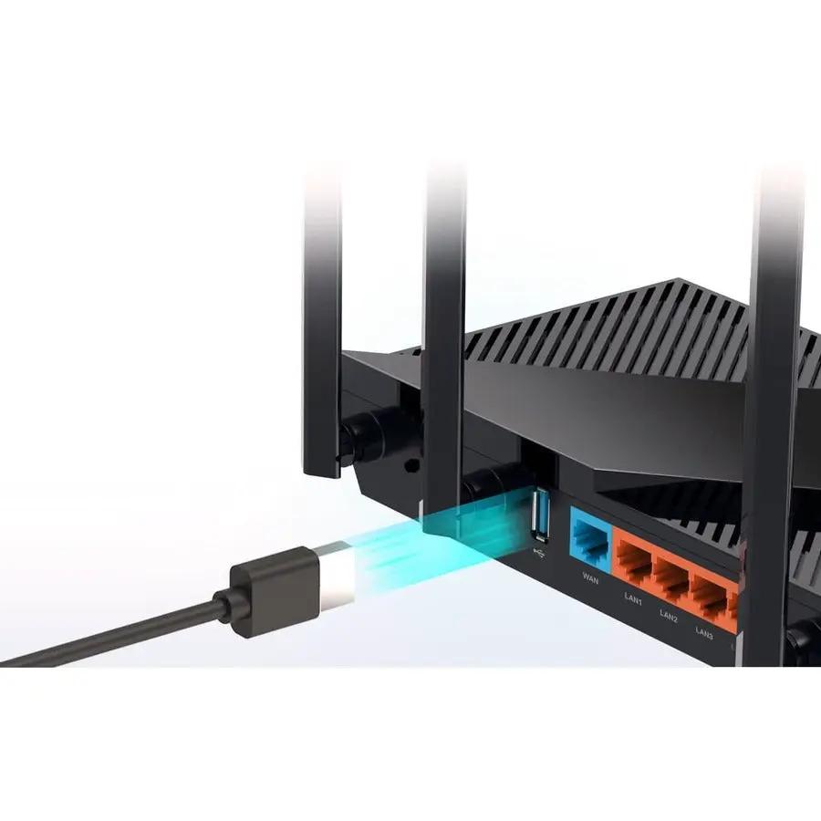 TP-Link Archer AX55 WiFi 6 router with USB 3.0; blue WAN port and orange LAN ports.