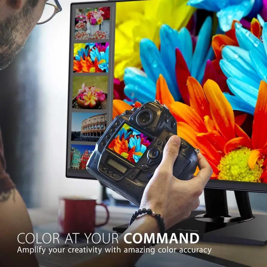 ViewSonic VP3256 32-inch 4K UHD IPS monitor on desk with a DSLR camera in front