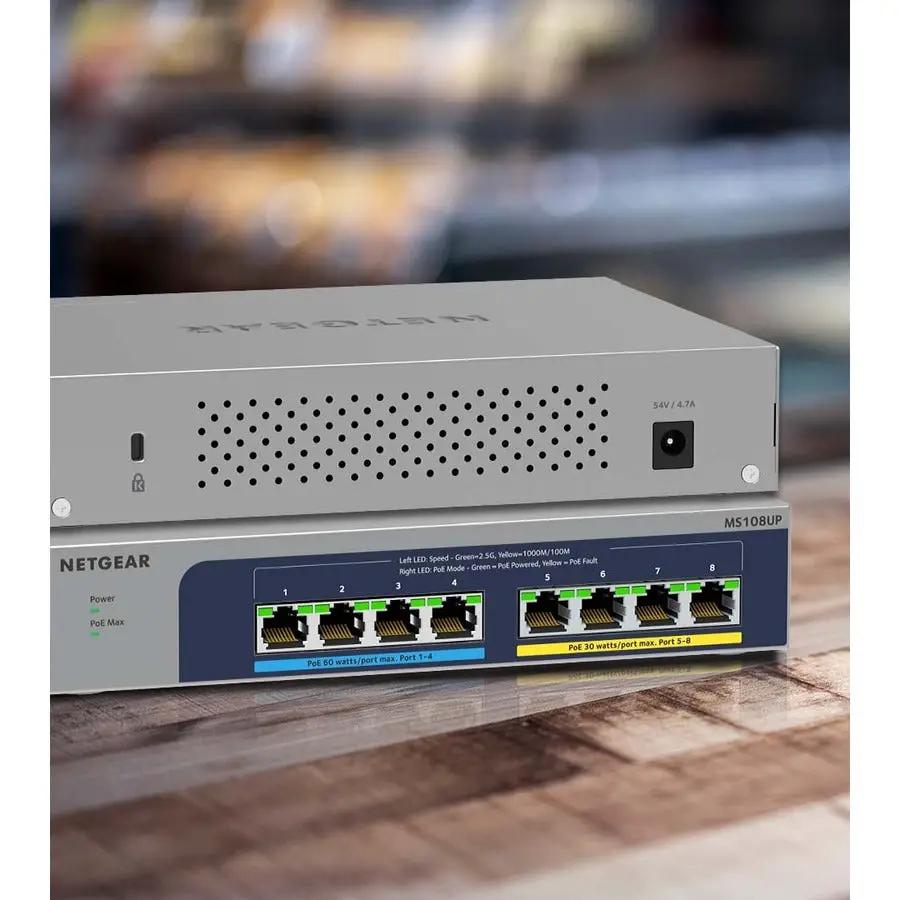 NETGEAR Plus Ultra60 8-port PoE switch, blue front panel with 8 RJ-45 ports