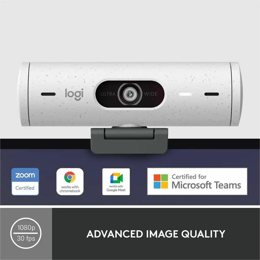 Logitech Brio 500 webcam, off-white, mounted on a monitor with Zoom and Teams certification logos visible.