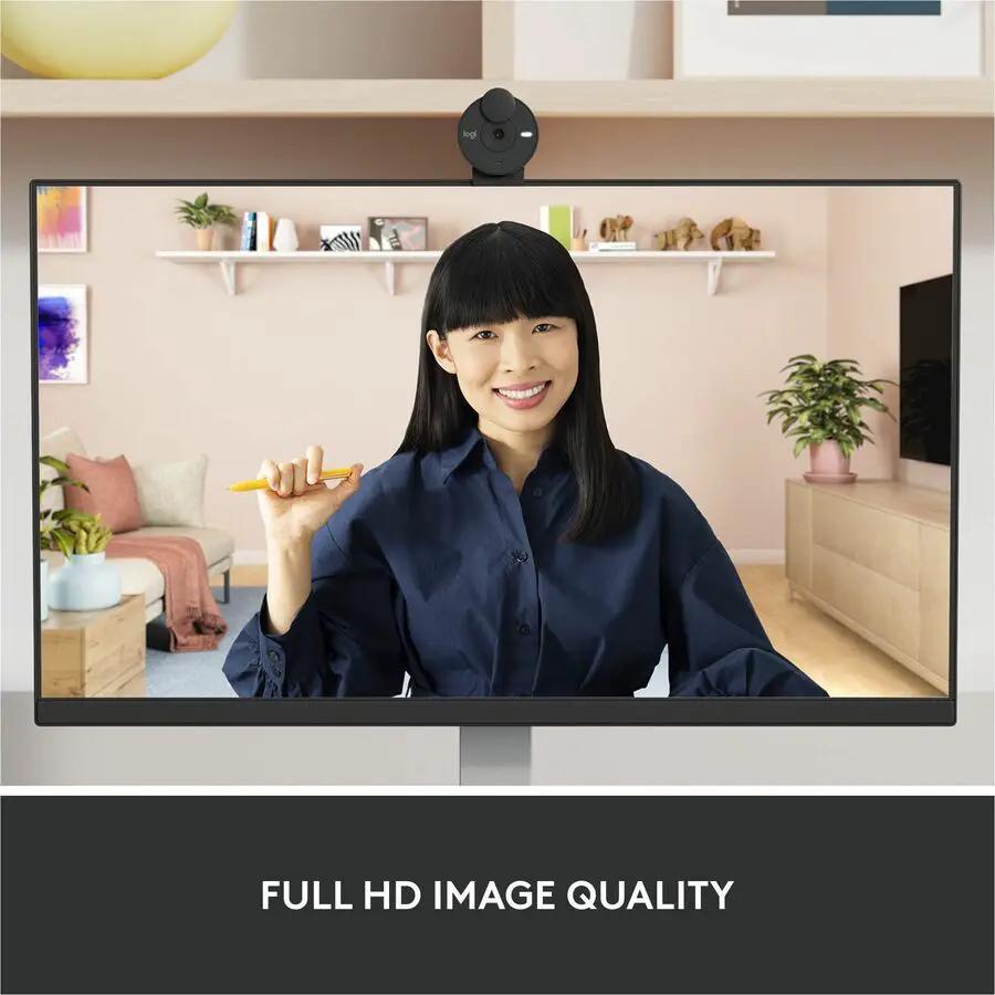Logitech Brio 305 webcam, black, mounted on monitor in home office setup