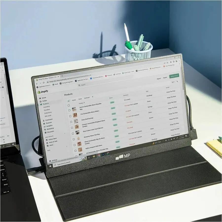 Mobile Pixels Fold 16-inch portable monitor with MP logo, 1080p FHD, 60Hz, laptop nearby