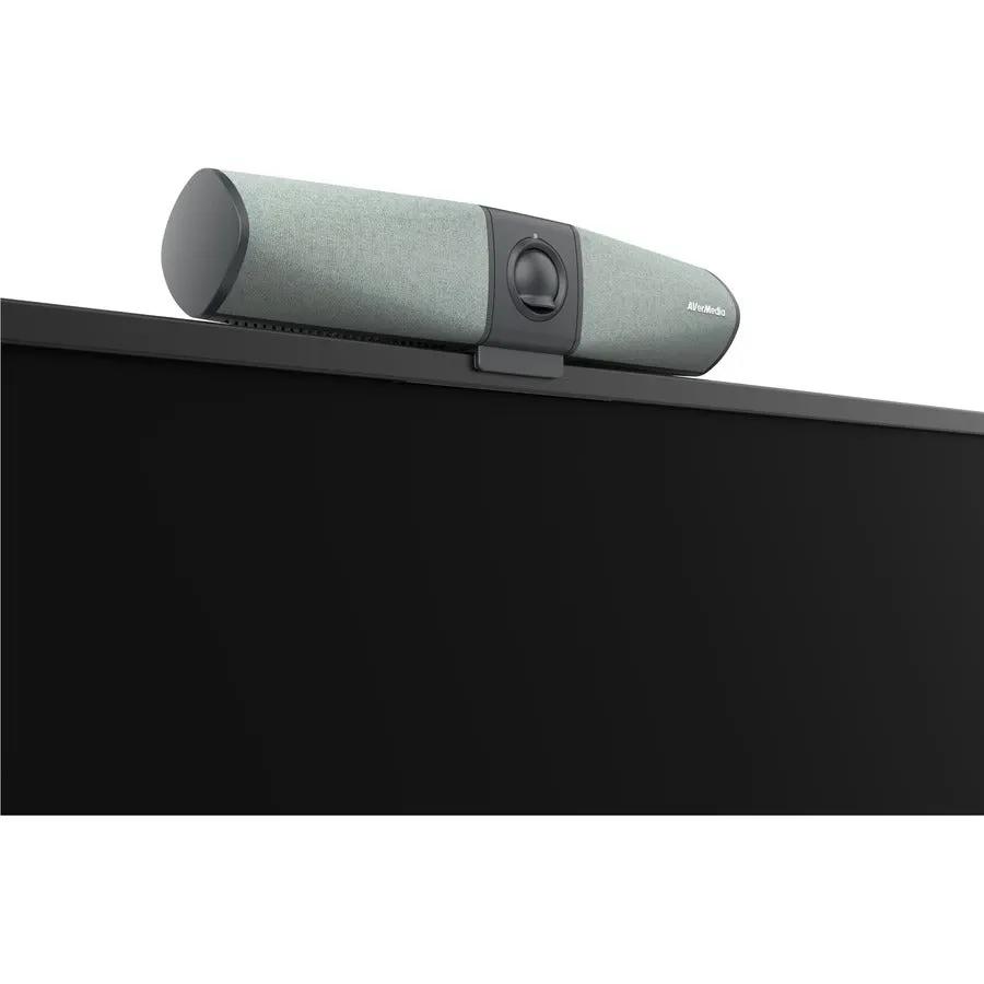 AVerMedia Mingle Bar webcam, gray fabric-covered bar-style camera mounted on top of a monitor.