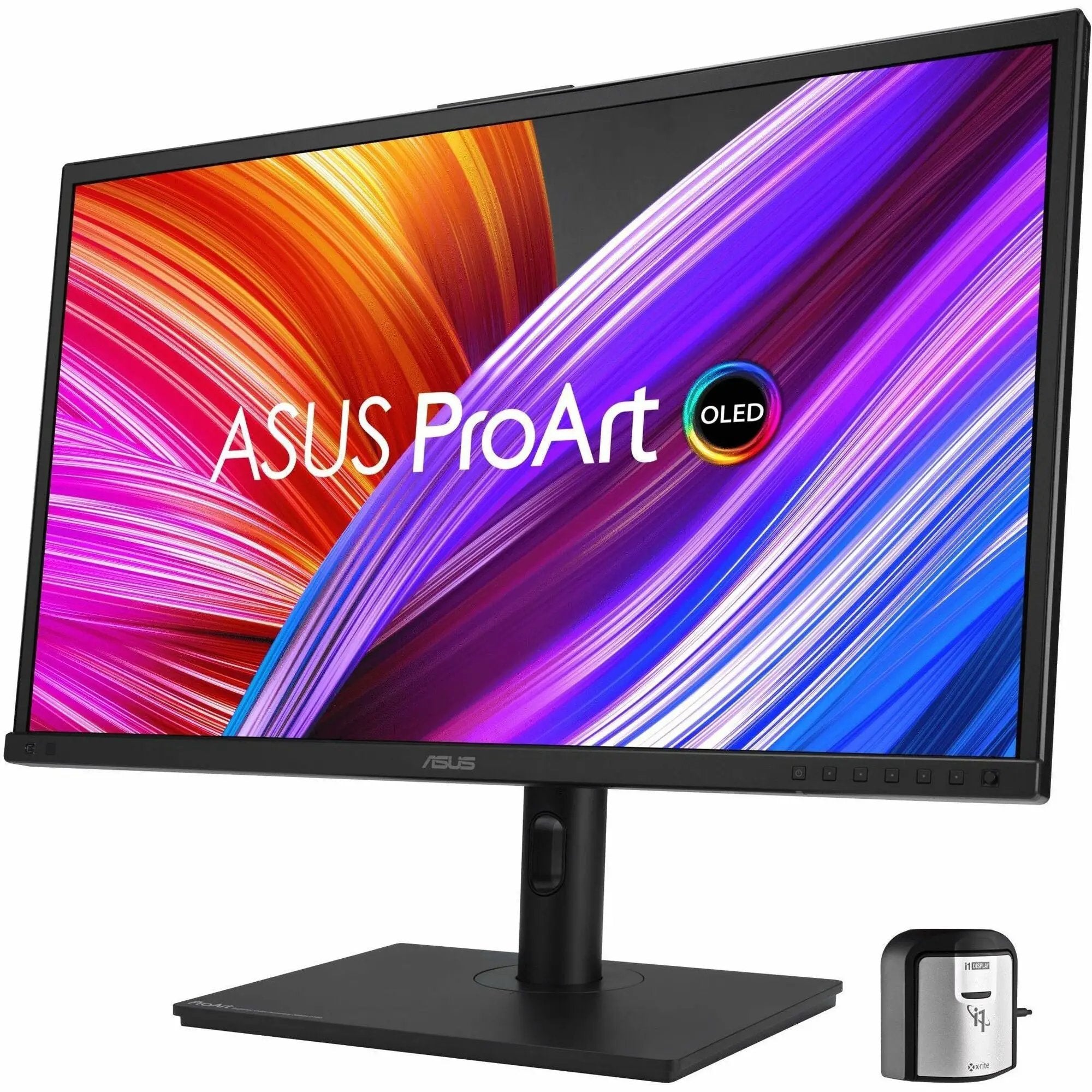 ASUS ProArt PA27DCE-K 27-inch 4K OLED monitor on desk with X-Rite i1Display color calibrator