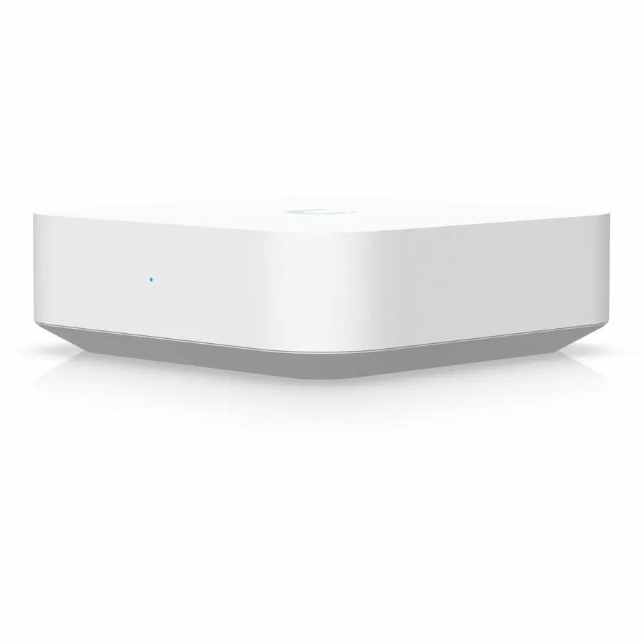 Ubiquiti UniFi Gateway Lite wired router, white compact Gigabit managed gateway with blue LED.