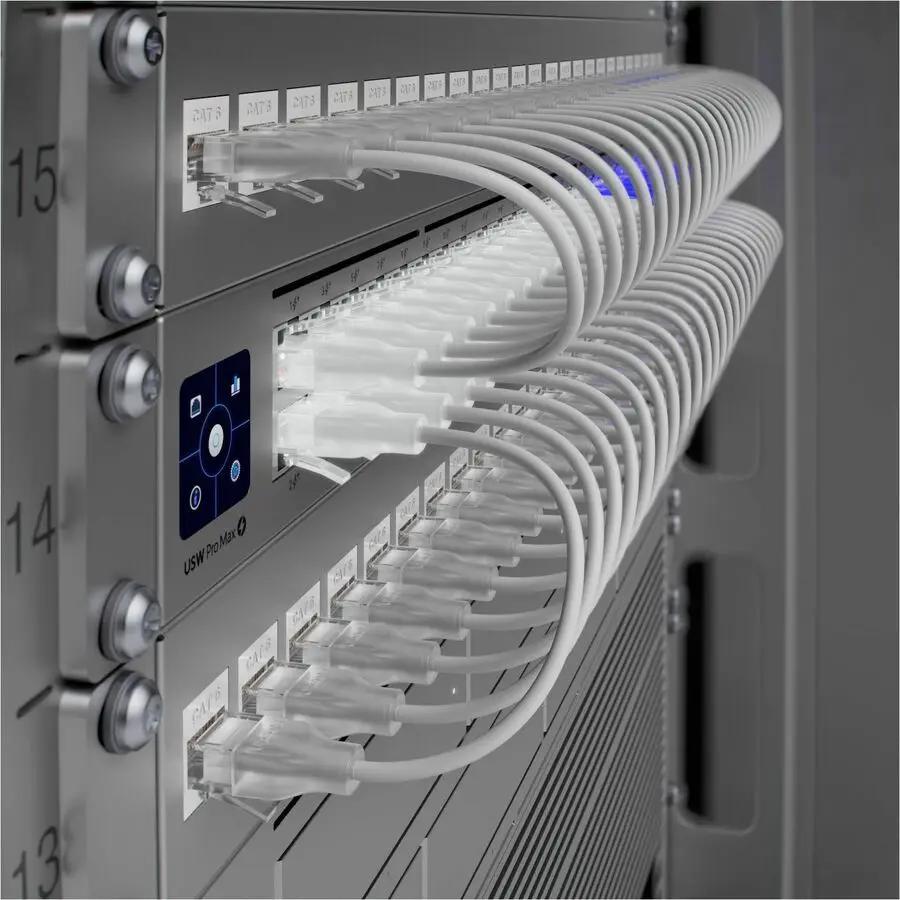 Ubiquiti UniFi Pro 48-Port PoE Managed Switch in a gray server rack with Ethernet cables