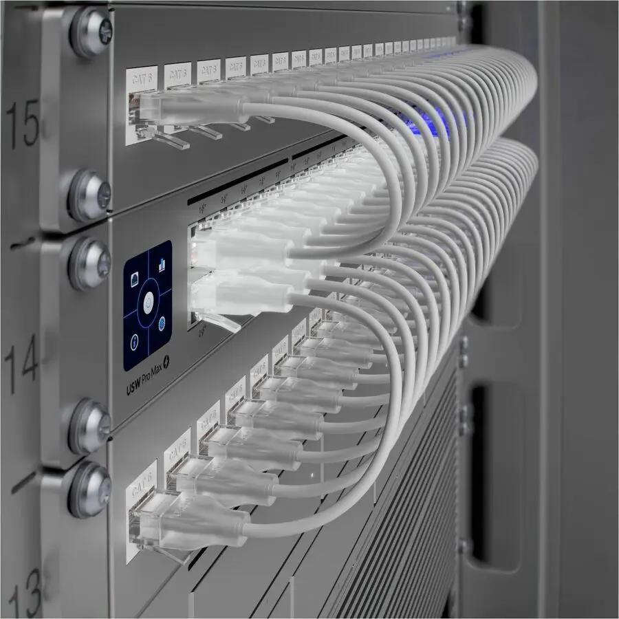 Ubiquiti USW Pro Max 48-port managed switch mounted in a server rack with Ethernet cables.