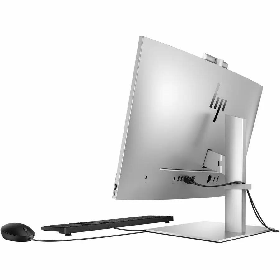 HP EliteOne 840 G9 all-in-one desktop with silver finish, keyboard and mouse on a white background.