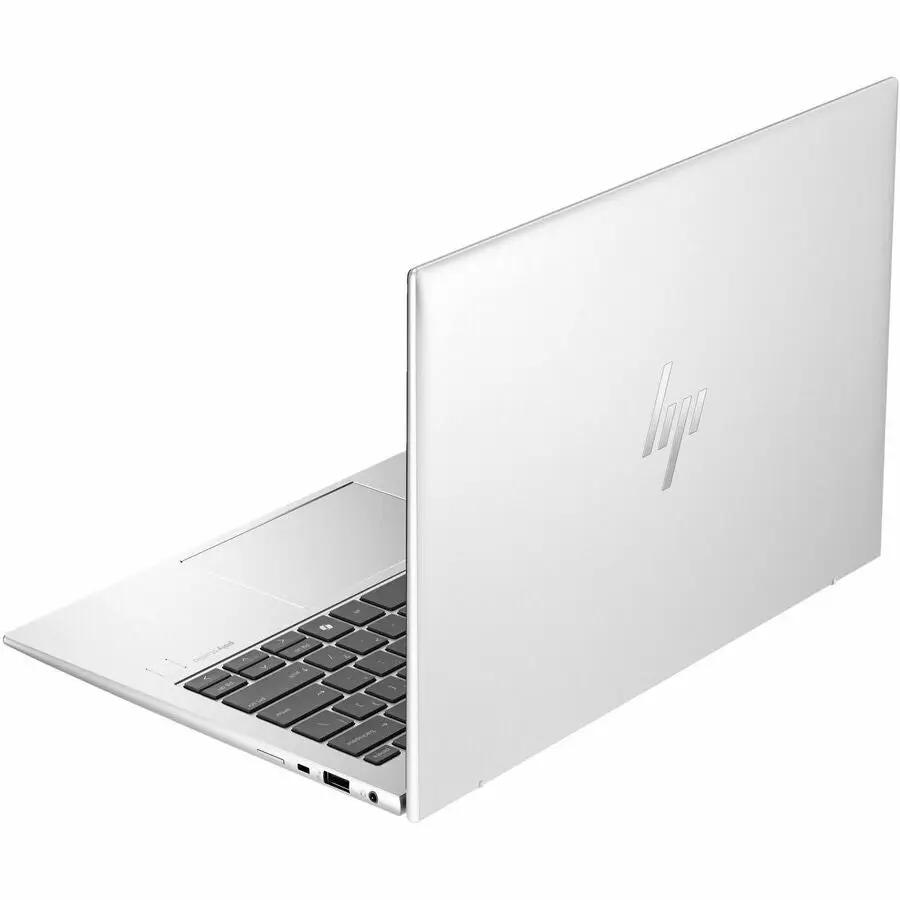 HP EliteBook 835 G11 laptop in silver, side view with keyboard visible and HP logo on lid