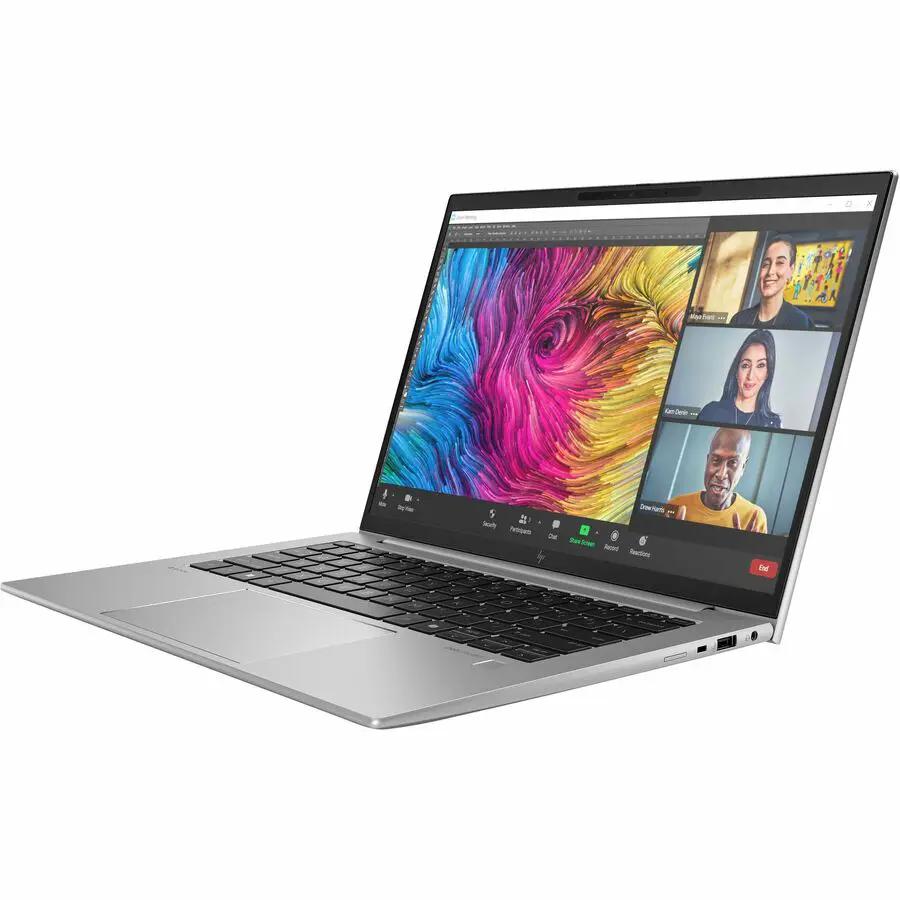 HP ZBook Firefly G11 mobile workstation laptop in silver with Zoom meetings on screen.